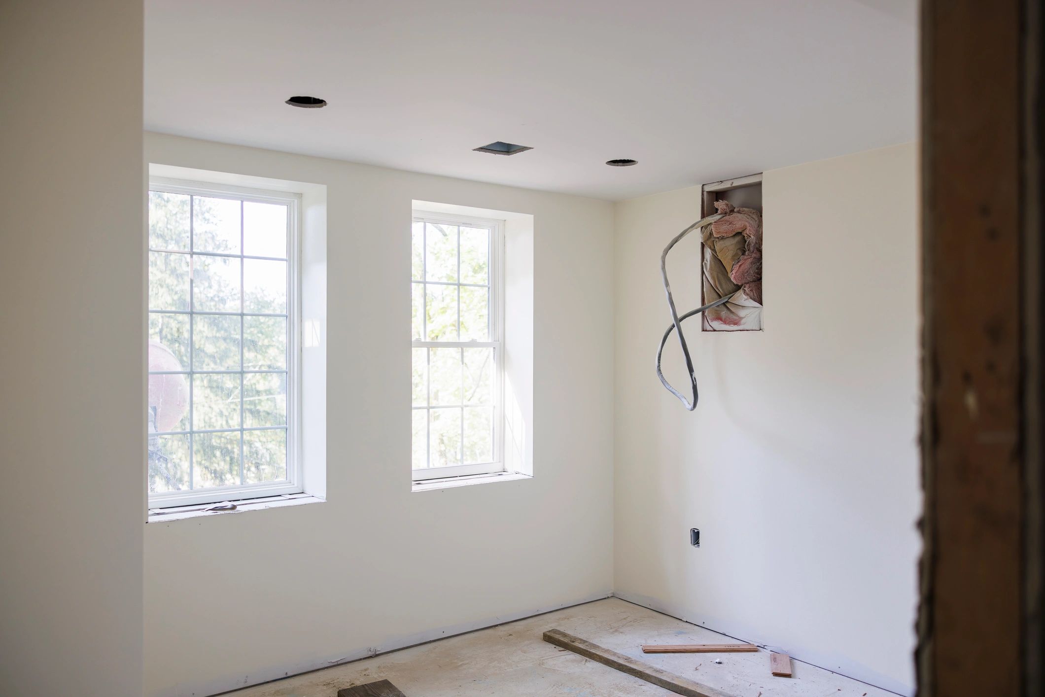 Freshly painted interior room with bright windows